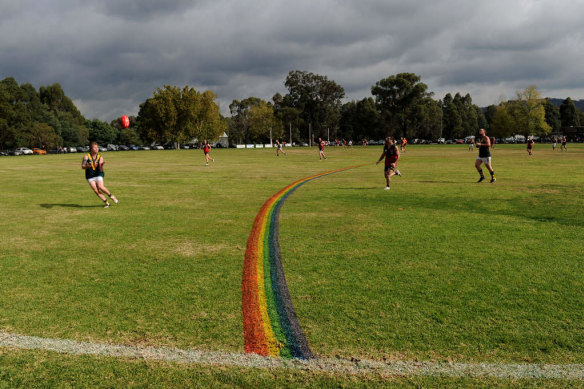 The 50-metre line painted in the rainbow colours during a game between Yarra Glen and Yarra Junction from the Yarra Valley Mountain District Football Netball League.