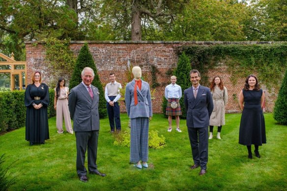 The Prince of Wales & YOOX Net-a-Porter group chairman Federico Marchetti with six of the Modern Artisans at the final collection review.