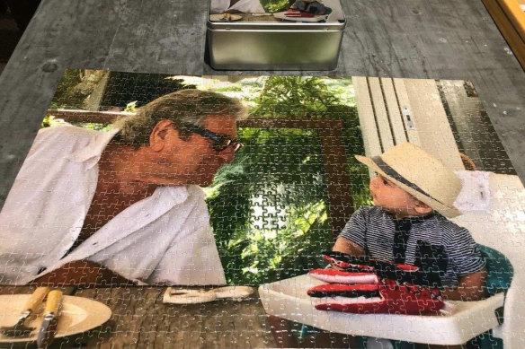 A jigsaw puzzle of Peter and his great-grandson, Oliver.