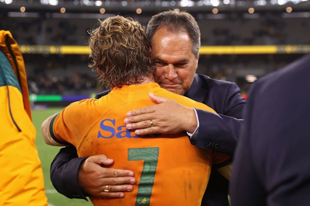 Michael Hooper of the Wallabies and coach Dave Rennie celebrate.