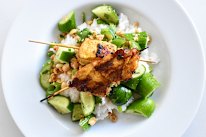 Satay chicken with cucumber salad and coconut rice is easy yet impressive.