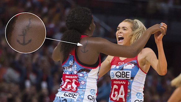 Tattoo you: Sam Wallace with Helen Housby after the win in the Sydney derby last week.