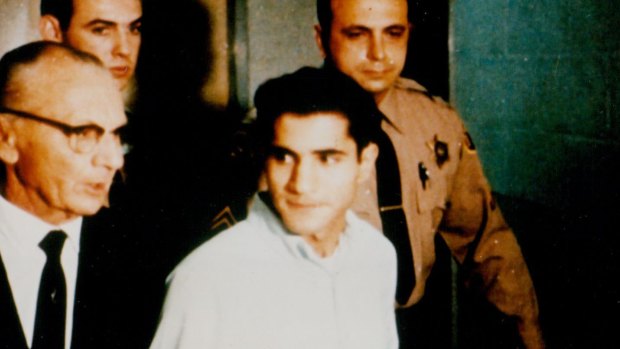 New evidence has emerged over the years that Sirhan Sirhan, in white shirt, may not have been the only shooter.