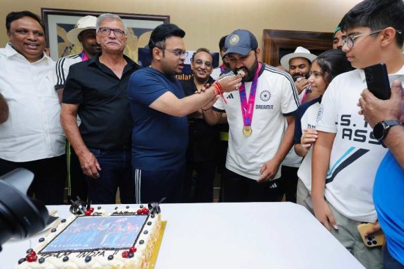 BCCI secretary Jay Shah hands birthday cake to Indian captain Rohit Sharma.