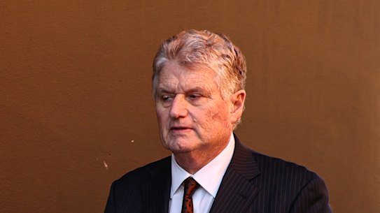 ATC chairman Peter McGauran leaves the meeting of members at Randwick racecourse on Tuesday.