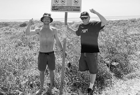 Community Shark Bite Kits founder Danny Schouten with friend, Kai McKenzie, who lost his leg to a great white shark while surfing in Port Macquarie in 2024.