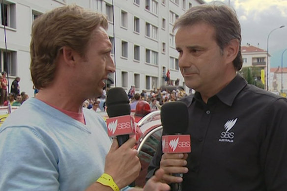 Mitchelton-Scott sporting director Matt White speaks to SBS commentator Michael Tomalaris in France at a previous Tour.
