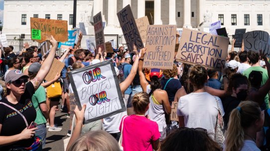 Abortion rights demonstrators chant outside the US Supreme Court in Washington DC after Roe V Wade was overturned