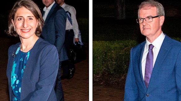 Gladys Berejiklian and Michael Daley leaving the leaders' debate on Wednesday night.