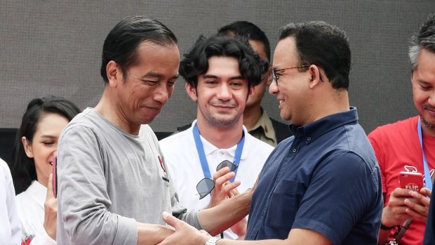 Indonesia President Joko Widodo and Anies Baswedan mark the opening of Jakarta’s underground rail system in 2019.