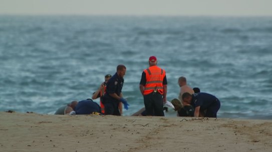 Rescuers tried to save three men after they got into trouble in the water.