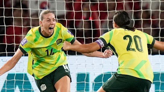 Australia’s Alanna Kennedy celebrates with Sam Kerr after scoring against South Korea.