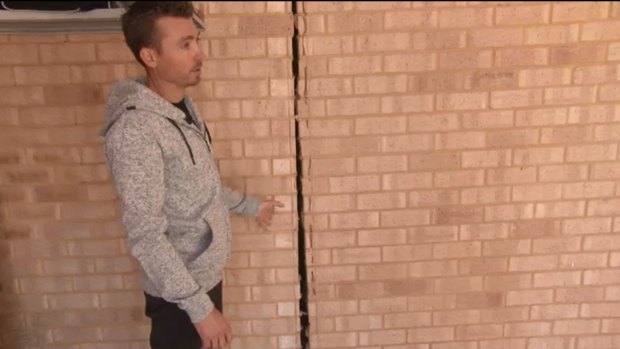 Chris Mettimano at his family's home in Yanchep that is sinking into the sand it sits on.