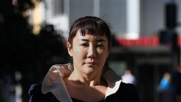 Yutian Li arrives at the District Court in Brisbane on Wednesday.
