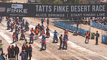 A motorcycle rider has died during the first day of the Finke Desert Race.