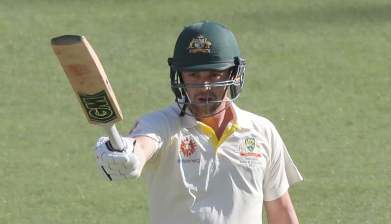 Steady: Travis Head brings up his half-century.