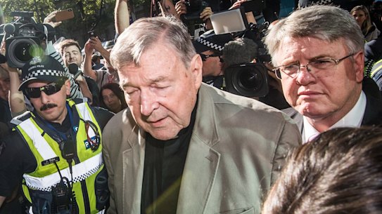 George Pell arrives at the County Court in Melbourne yesterday. 