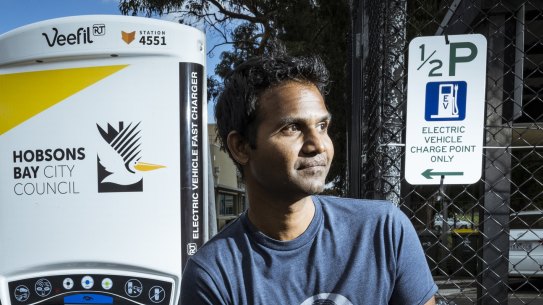 Ajo Pathmanathan at an out-of-order EV charging station in Altona. 