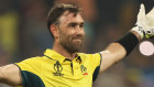 Glenn Maxwell celebrates after hitting a six for the winning runs.