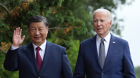 President Joe Biden and China’s President President Xi Jinping walk in the gardens at the Filoli Estate in Woodside, California,