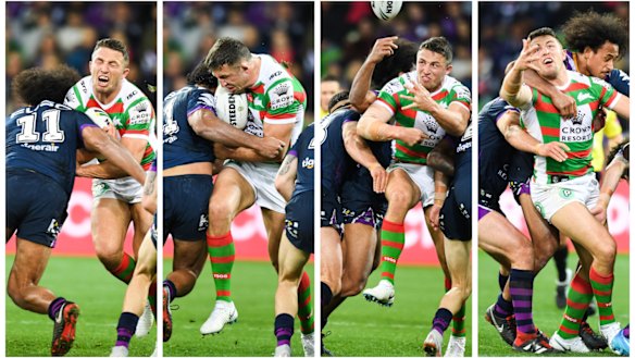 Sam Burgess is crunched by Felesi Kaufusi.