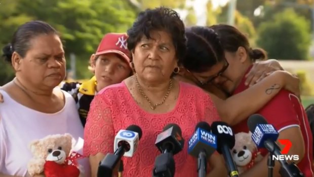 Advocate for Aboriginal and Torres Strait Islander rights and the family's spokeswoman Gracelyn Smallwood with some family members and elders mourning the death of two boys who died in a far north Queensland river.
