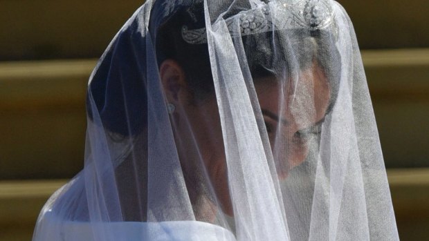 Meghan Markle arrives for her wedding ceremony to Britain's Prince Harry at St. George's Chapel in Windsor Castle in Windsor, near London, England, Saturday, May 19, 2018. (Ben Birchhall/pool photo via AP)