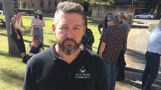 Men speak out against domestic violence on women at a rally in Queens Park. Paul Ferry from Safe Haven Community.