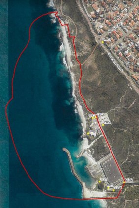 The proposed marina outlined in red, with the reef (dark area) visible below it. 