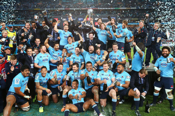 The Waratahs celebrate after beating the Crusaders in the 2014 Super Rugby final.