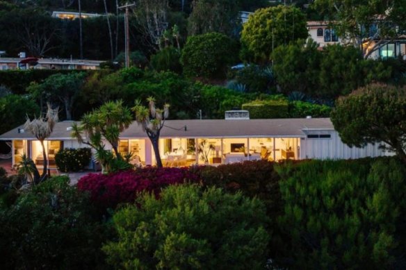 The home is set off a winding cliffside lane. 