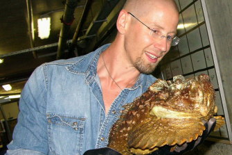 Professor Bryan Fry with one of the stonefish that was milked of venom for the study.