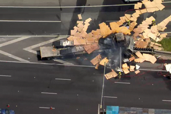 Police and emergency services responded after two vehicles collided and caught fire on the Western Ring Road/Calder Freeway at Keilor Park on Thursday morning