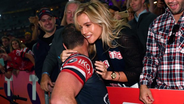 'Jackpot': Barge gives Cordner a hug after the Roosters wrapped up back-to-back premierships.