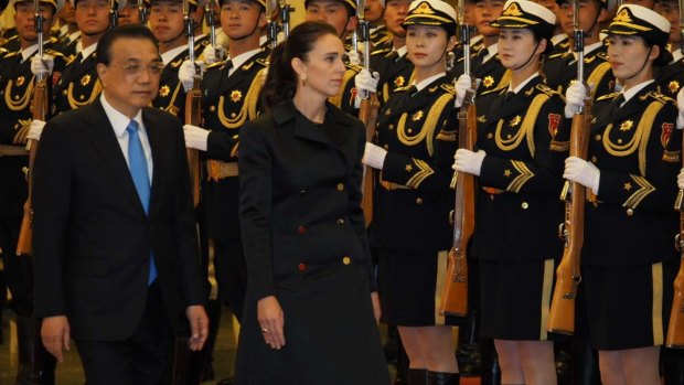 China rolled out the welcome mat for Prime Minister Jacinda Ardern on her first visit to Beijing. Premier Li Keqiang greeted her at the Great Hall of the People, complete with military guards of honour. 