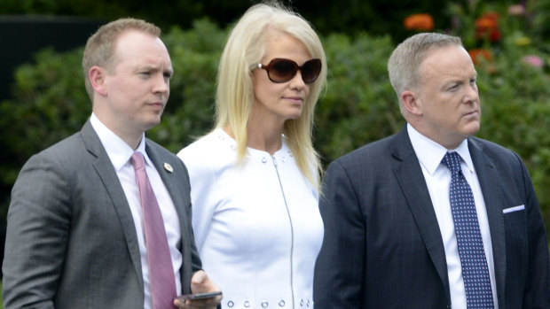 Cliff Sims (left) pictured with White House advisor Kellyanne Conway and former press secretary Sean Spicer in 2017.