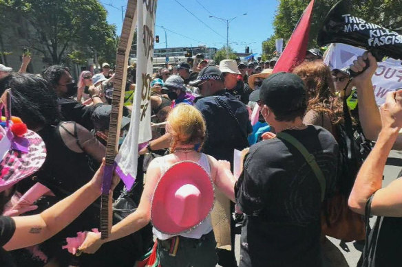 Police and protesters clash.