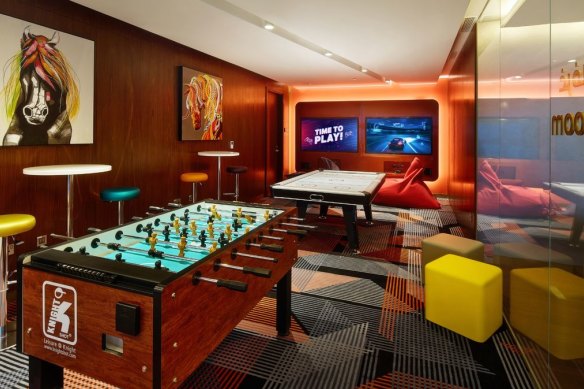 Etihad’s business class lounge games room.