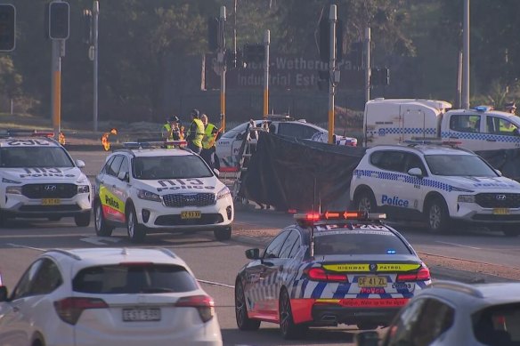 A woman has died in a collision between a car and a truck in Wetherill Park.