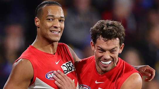 ADELAIDE, AUSTRALIA - JUNE 15: Joel Amartey of the Swans celebrates a goal with Oliver Florent during the 2024 AFL Round 14 match between the Adelaide Crows and the Sydney Swans at Adelaide Oval on June 15, 2024 in Adelaide, Australia. (Photo by Sarah Reed/AFL Photos via Getty Images)