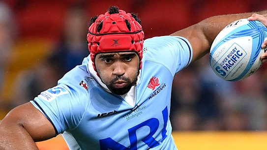Waratah Langi Gleeson is tackled during the clash against the Reds in Brisbane.