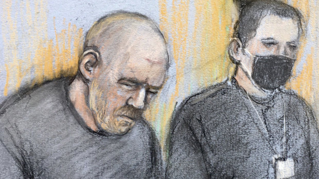 This court artist sketch shows serving police constable Wayne Couzens, left, appearing in the dock at Westminster Magistrates’ Court in Londonin March.