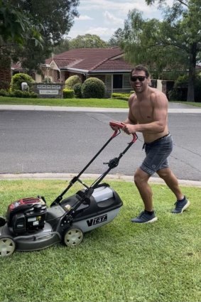 Dale Finucane mowing Damien Cook’s lawn last summer