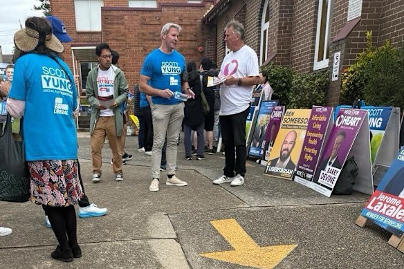 Gareth Hales, multimillionaire son of Plymouth Brethren Christian Church leader Bruce Hales, wears a blue Scott Yung campaign shirt at the Bennelong polling booth on April 30. 