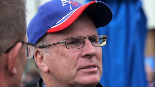 Banned for life: Trainer Robert Smerdon (centre).