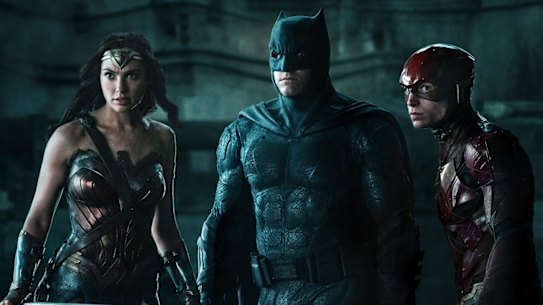 Gal Gadot, Ben Affleck and Ezra Miller in a scene from the original Justice League.