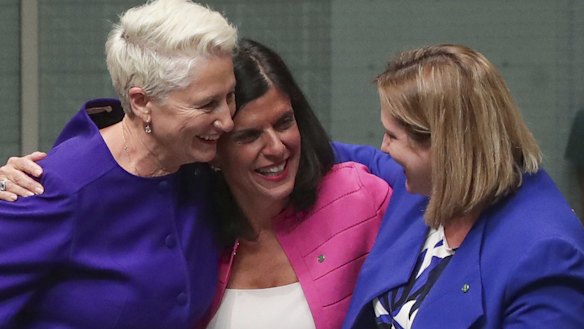 Kerryn Phelps, Julia Banks and Rebekha Sharkie celebrate after the Medevac Bill passes the House of Representatives.