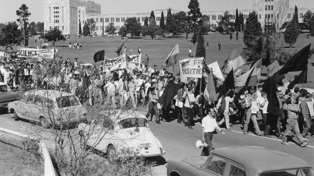 Students and staff marching off campus.