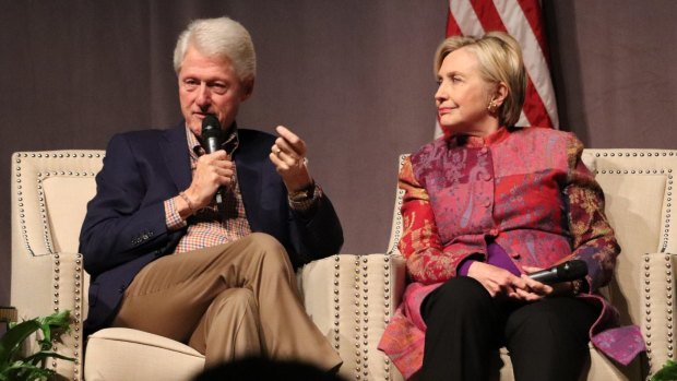 Money-makers: Bill and Hillary Clinton have seen their reputations questioned as their wealth has grown.