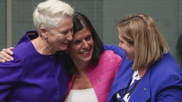 Kerryn Phelps, Julia Banks and Rebekha Sharkie celebrate after the Medevac Bill passes the House of Representatives.
